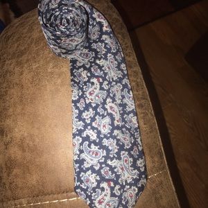 Silver and red neck tie